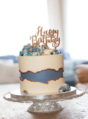 Elegant blue & white birthday cake